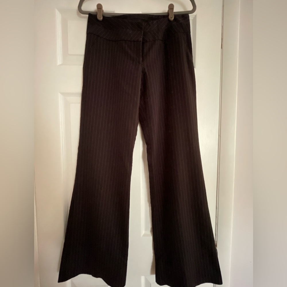 Black and white pinstripe trousers